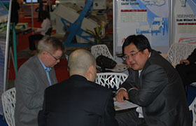 Discussion with clients during the Thailand VICTAM exhibition